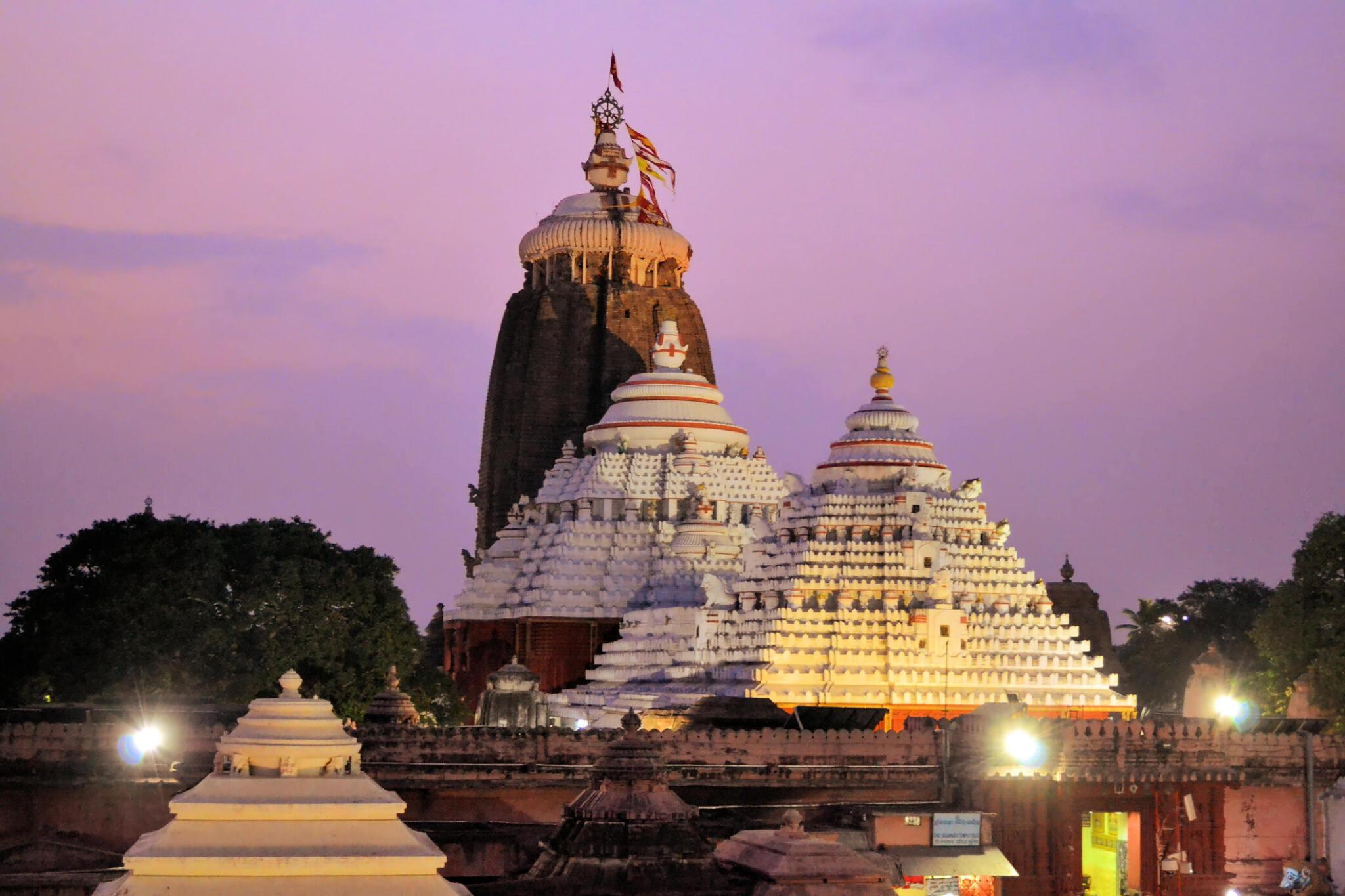 Magnificent temple in Odisha lit up at dusk, symbolizing cultural heritage near Barbil
