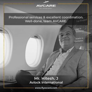 Mr. Hitesh J smiling onboard a luxury jet, praising service quality