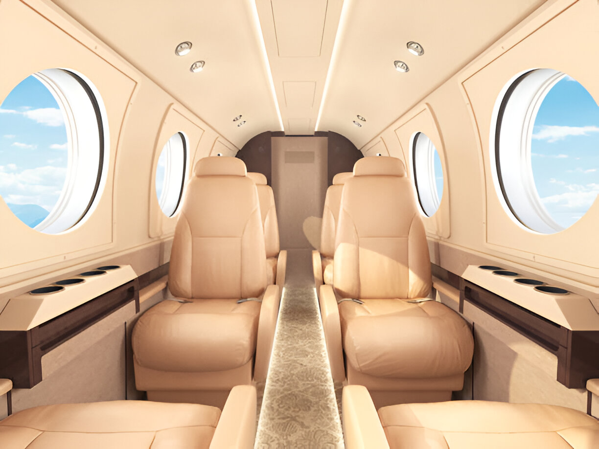 Luxurious leather seating inside a 6-seater light private jet, ideal for short-distance premium air travel with comfort and style