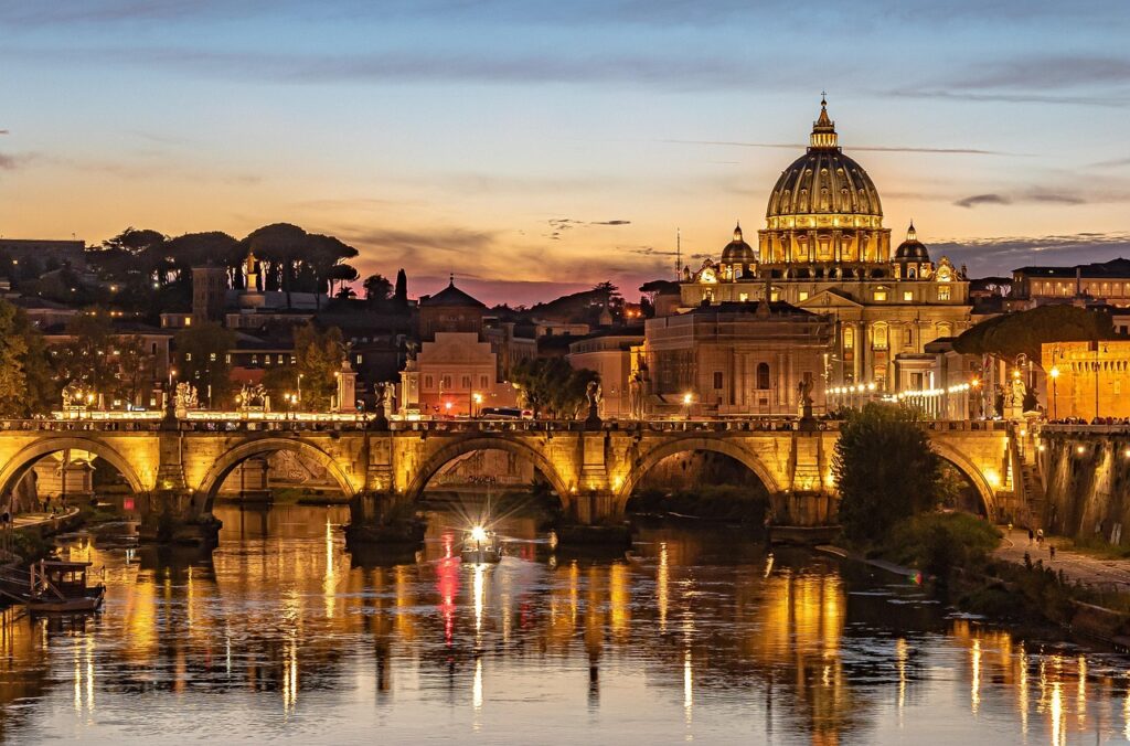 Scenic sunset view of St. Peter’s Basilica and Tiber River in Rome, Italy
