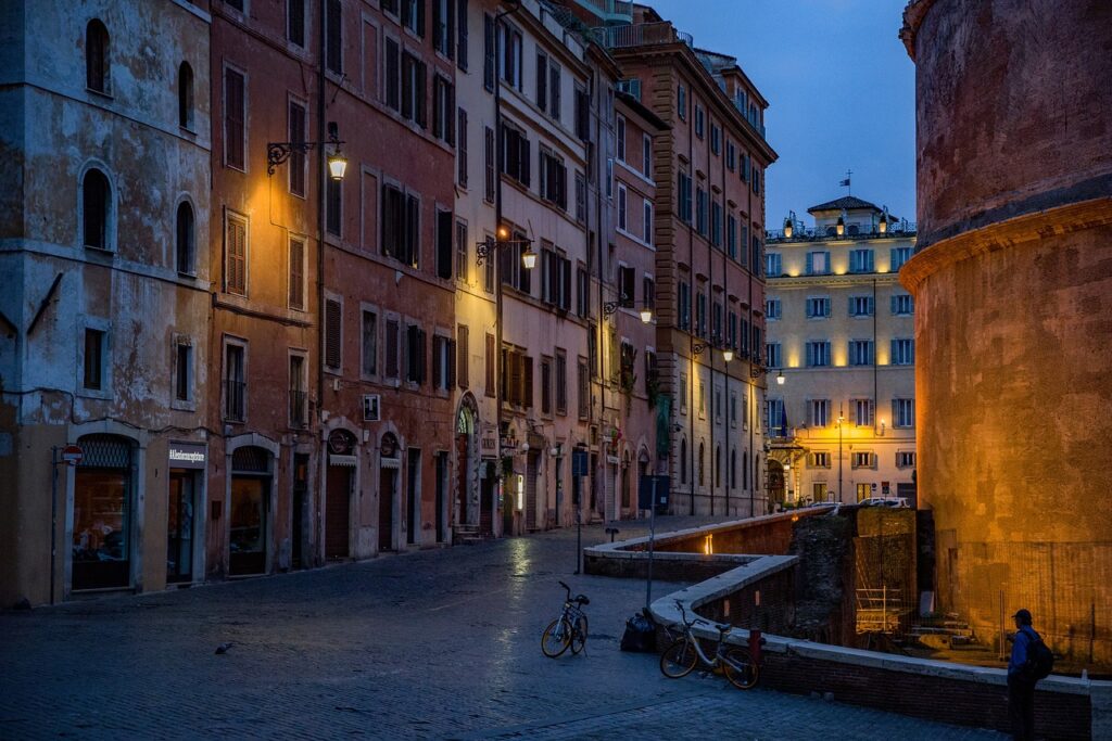 Quiet Roman street at dawn with historic architecture and soft lighting