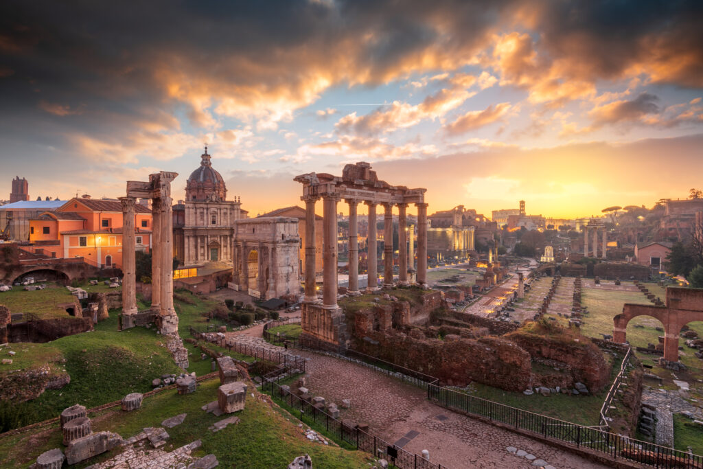 Roman Forum at sunset, showcasing luxury destination access via Fly Avcare private jet charters.
