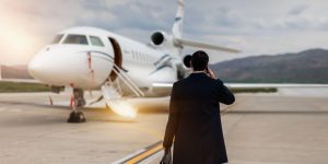 Traveler boarding a private jet for a luxury leisure trip
